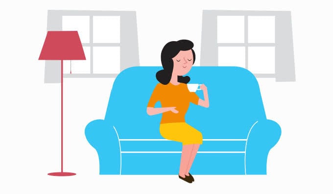 Cartoon woman sitting on a couch sipping a mug